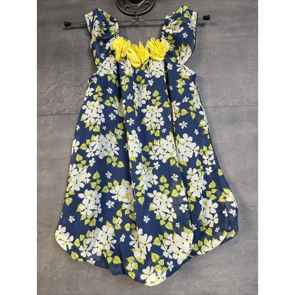 navy blue floral baby bubble romper by Little Lass Floral Neckline 18mths
